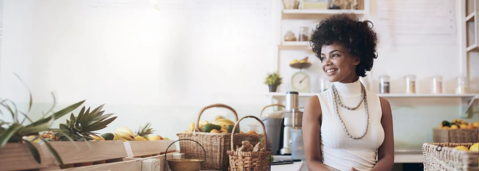 woman sits in comfort knowing her business is protected with a proper business insurance policy from The Hartford